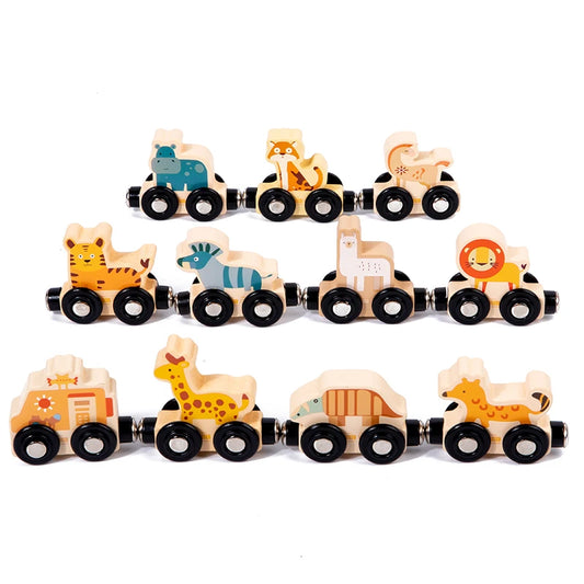 Set of wooden toy animals on a white background