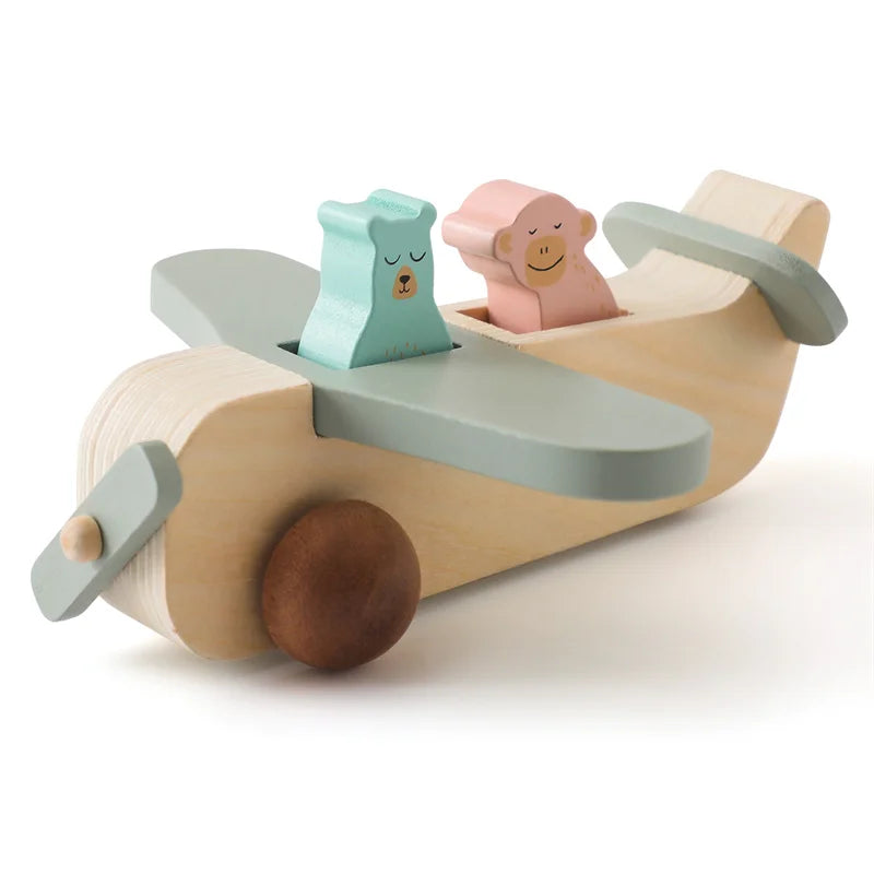 Wooden toy airplane with two animal figures on a white background