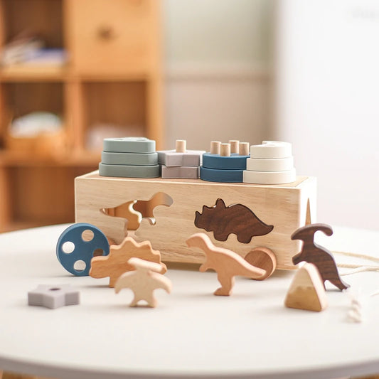 Set of wooden toys on a table with a blurred background