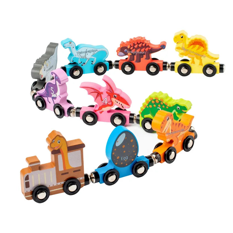 Set of colorful toy trains with dinosaur designs on a white background